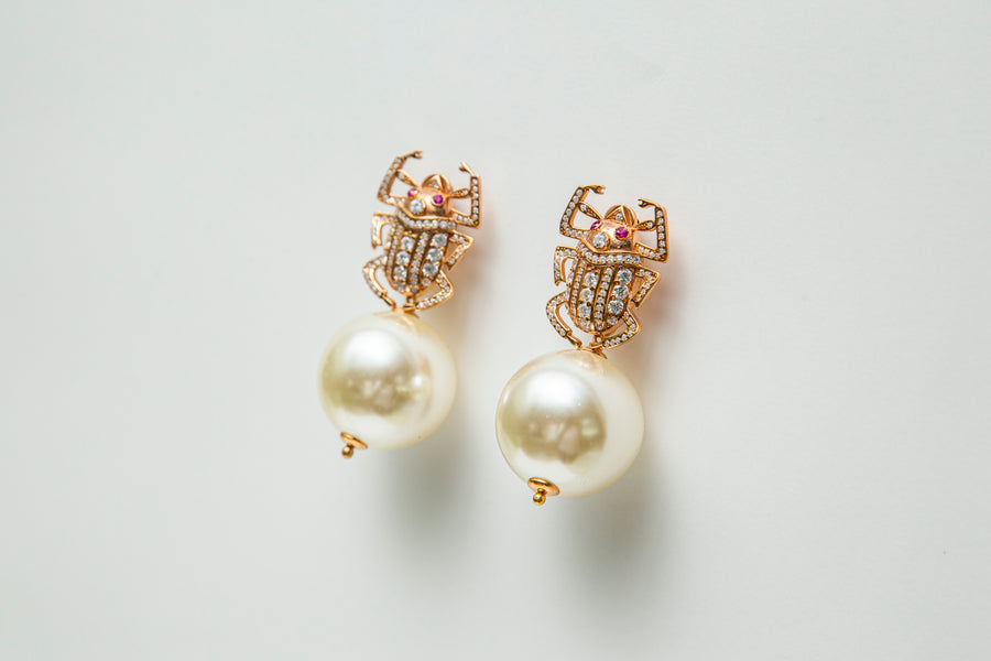 Sparkly Rose Gold Beetle Drop Earring with Mini White Ball